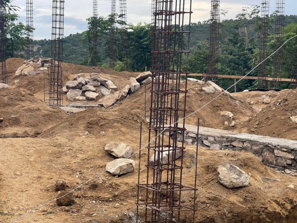 Excavated trenches and steel column cages