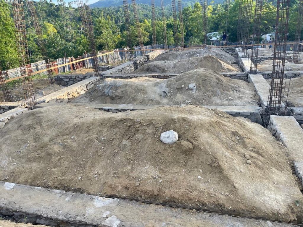 Wide view of foundation trenches and earthworks