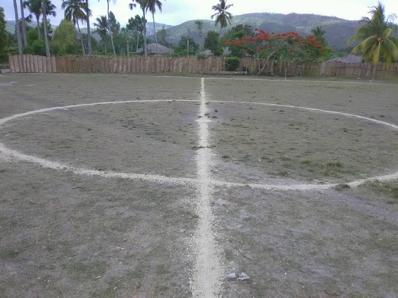 Local football players in Ginode, Haiti